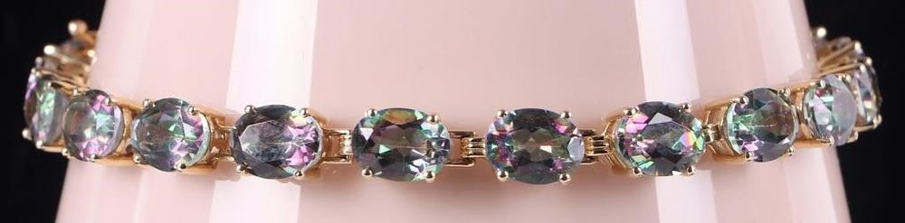 Lot 232272: 10K YELLOW GOLD TOURMALINE LADIES TENNIS BRACELET