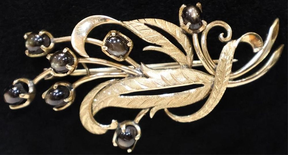 Lot 232280: 14K YELLOW GOLD CAT'S EYE SAPPHIRE FEATHER BROOCH