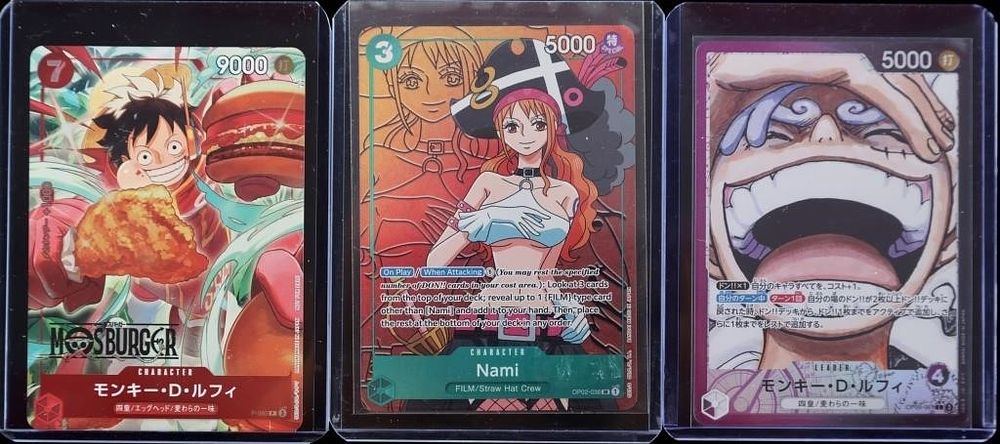 Lot 232342: ONE PIECE CARDS HOLOS NAMI LUFFY MOS BURGER (3)