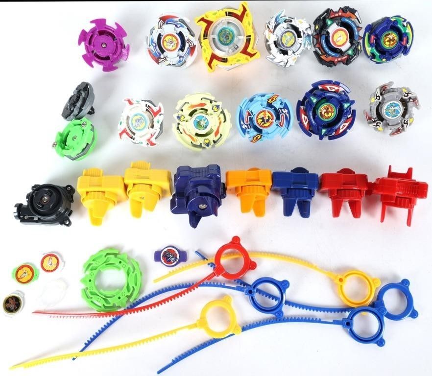 Lot 232349: VINTAGE BEYBLADES 13 SPINNERS 6 RIPCHORDS 2002