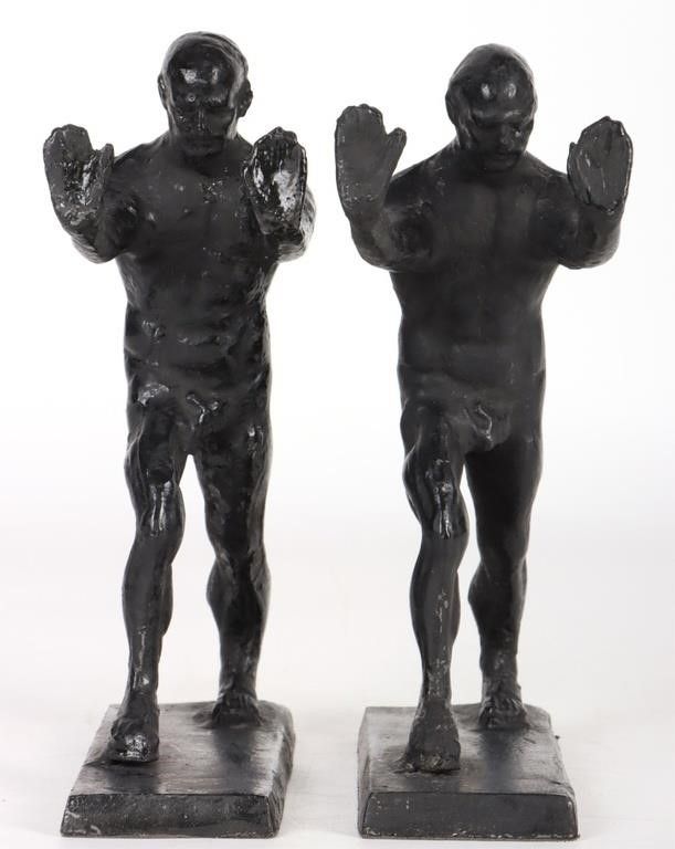 Lot 232408: CAST IRON MEN PUSHING MODERN BOOKEND PAIR