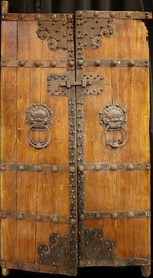 ANTIQUE CHINESE IRON ELMWOOD TEMPLE DOORS. Antique Chinese Iron &amp; Elmwood Foo Dog adorned 