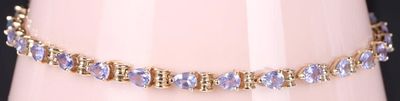 PURPLE IOLITE 14K YELLOW GOLD LADIES BRACELET. Purple iolite 14K yellow gold ladies tennis 