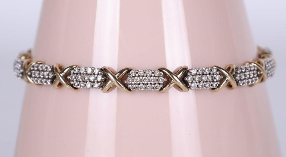 Lot 233207: 1.55 CTW DIAMOND 10K GOLD LADIES "X" BRACELET