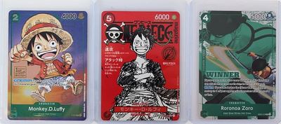 ONE PIECE CARDS LUFFY PROMOS ZORO WINNER (3). Lot of three One Piece Cards, to include EN 
