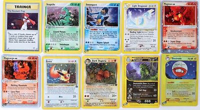 RARE/UNCOMMON VINTAGE POKEMON LOT '02 TYRANITAR 10. Lot of ten vintage rare/uncommon Pokemon TCG 
