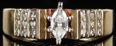 14K YELLOW GOLD LADIES RING W/ BRILLIANT DIAMONDS. 14k yellow gold ladies ring with a brilliant 