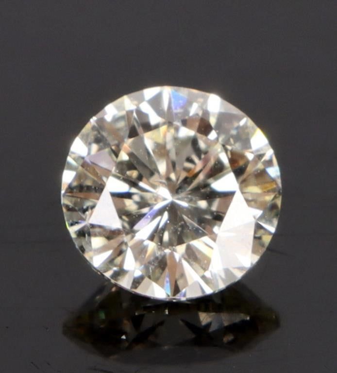Lot 235188: GIA 1.25CT NATURAL I1 N COLOR ROUND CUT DIAMOND