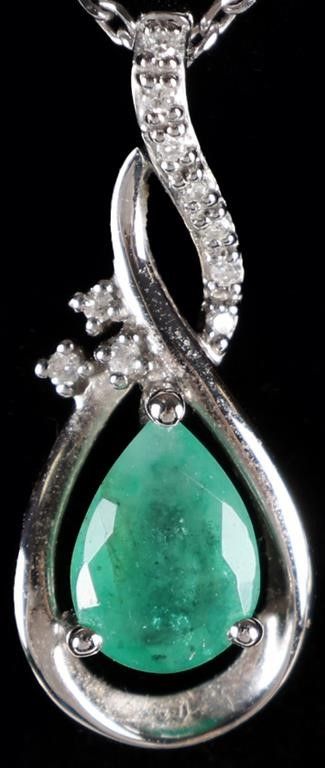 Lot 235341: 10K WHITE GOLD LADIES NECKLACE W/ EMERALD & DIAS