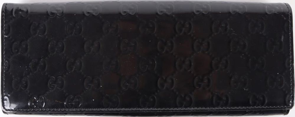 Lot 235348: GUCCI BLACK GUCCISSIMA EMBOSSED MONO LONG WALLET