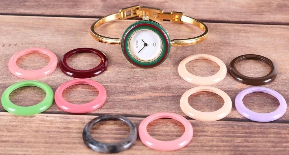 Lot 235380: GUCCI 11/12.2 GOLD PLATED LADIES WATCH W/ BEZELS