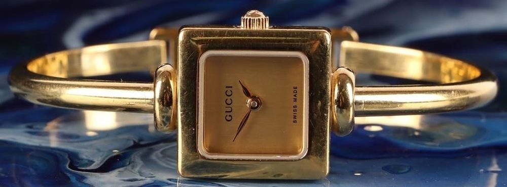 Lot 235442: GUCCI 1900 L SWISS MADE SAPPHIRE GOLD TONE WATCH