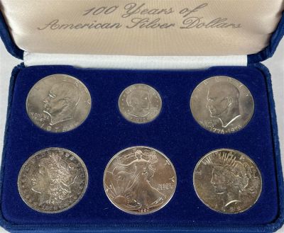 100 YEARS OF AMERICAN SILVER DOLLARS. INCLUDES IKE DOLLAR, S.B.A., BICENTENNIAL IKE, 1921 MORGAN 