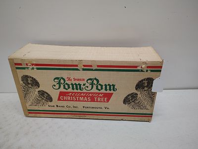 Christmas tree. pom-pom aluminum Christmas tree good condition Dimensions: 13 x 26 x 8 in