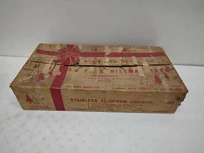 Christmas tree. stainless aluminum tree good condition box has some tears Dimensions: 6 x 13 x 25 in