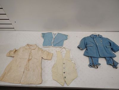 vintage clothing. childs and adult clothing Dimensions: 8 x 15 x 20 in