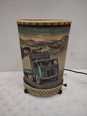 Lamp. spinner lamp may need new bulb not sure if it works Dimensions: 12 x 6 x 7 in