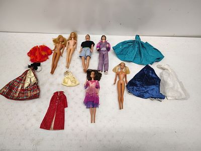 Barbie dolls. 1960s Barbie dolls with clothing Dimensions: 12 x 12 x 12 in