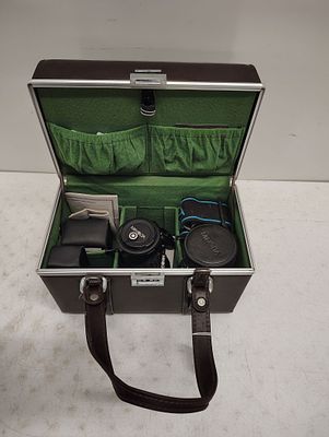 vintage camera. Minolta camera with lens. Dimensions: 11 x 13 x 8 in