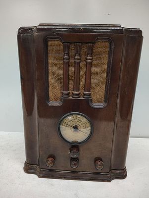 radio. Delco radio not sure if it works or not. Dimensions: 18 x 15 x 12 in