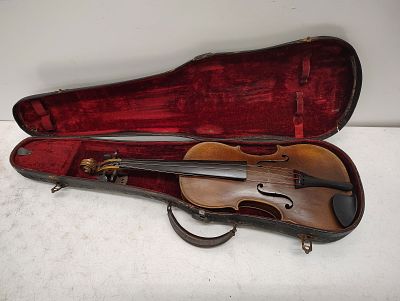 violin. no makers name case is rough Dimensions: 5 x 31 x 11 in