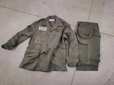 military items. US Army jacket US Army pants, jacket, and hat Dimensions: 6 x 17 x 16 in