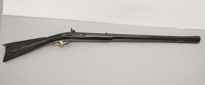Gun. precussion rifle with flared barrel has some rust caliber is unknown Dimensions: 53 x 2 x 8 in