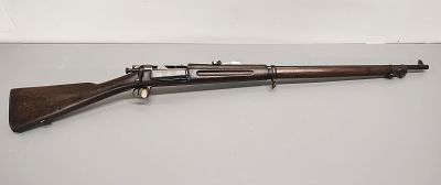 Gun. Springfield model: 1898 30-40 Krag full stock serial number: 387859 Dimensions: 50 x 3 x 8 in