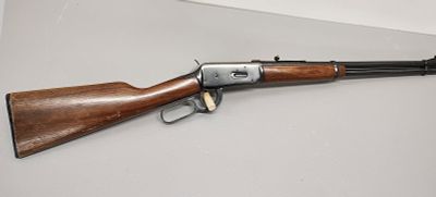 Gun. Winchester model: 94 30-30 caliber serial number: 4083592 Dimensions: 38 x 2 x 7 in