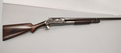 GUN. Winchester model: 1897 12 gauge pump serial number: D257822 Dimensions: 46 x 2 x 6 in