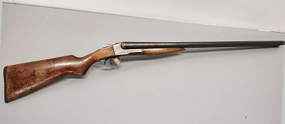Gun. Newport model: CN 12 gauge serial number:T70025 stock is cracked Dimensions: 46 x 2 x 7 in
