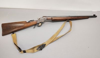 Gun. Stevens .22 target drop block with peep sight serial number: 90052 Dimensions: 41 x 2 x 6 in