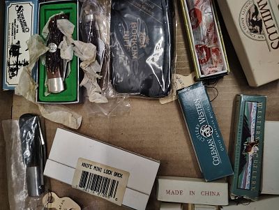 Knives. misc pocket knives mostly new knives Dimensions: 6 x 6 x 6 in