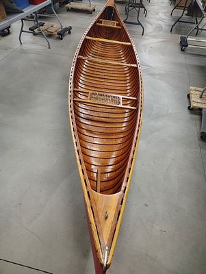 canoe. 1950's canoe 17 foot, no maker's mark or serial numbers we can see. Please reference 