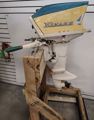 boat motor. 1950's wizard 7.5 hp motor Dimensions: 54 x 26 x 27 in