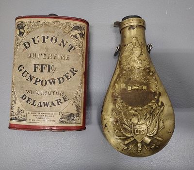 Powder cans. dupont gun powder tin powder flask- missing the spout Dimensions: 4 x 8 x 5 in