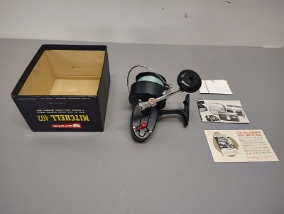 Fishing items. Garcia mitchell 402 salt water looks like it has never been used half of the box 