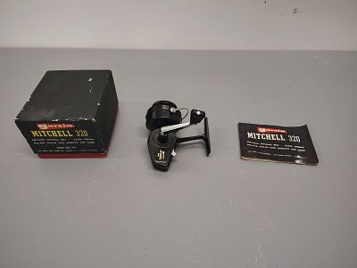 Fishing items. Garcia MItchell 320 never been used with original box Dimensions: 4 x 5 x 6 in