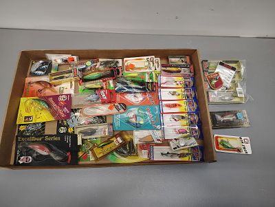 Fishing items. variety of lure Dimensions: 4 x 26 x 16 in