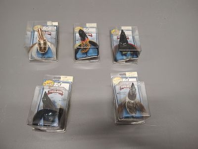 Fishing items. 5 bird lures in original boxes Dimensions: 4 x 14 x 9 in