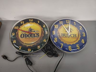 Beer clocks. O'Doul's non-alcoholic brew and Busch clocks are 14 in diameter clocks are not 