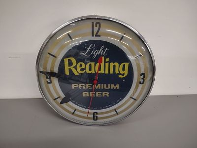 Beer clock. Light Reading Premium Beer PAM clock lights up and works 15'' diameter Dimensions: 
