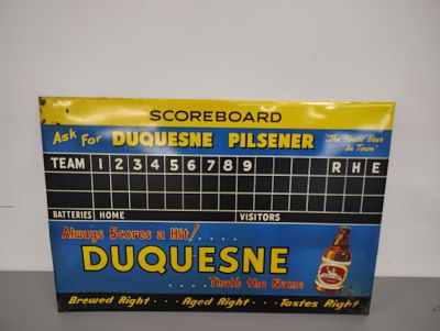 Scoreboard. Duquesne Pilsner scoreboard tin over cardboard sign Dimensions: 19 x 28 x 1 in