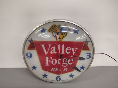 Beer clock. Valley Forge Beer clock lights up and works plastic face Dimensions: 15 x 15 x 5 in