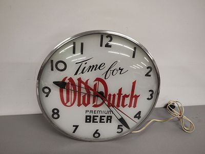 Beer clock. Old Dutch Beer clock lights up and works Dimensions: 15 x 15 x 5 in