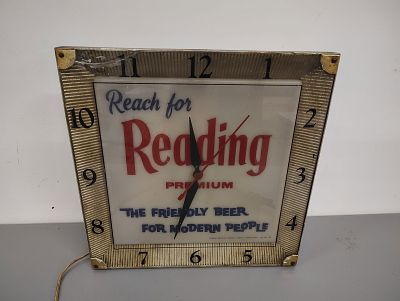 Beer clock. Reading Beer has a crack on the 11 lights up and works Dimensions: 16 x 16 x 5 in