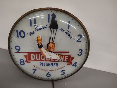Beer clock. Duquesne Beer clock lights up and works Dimensions: 15 x 15 x 4 in