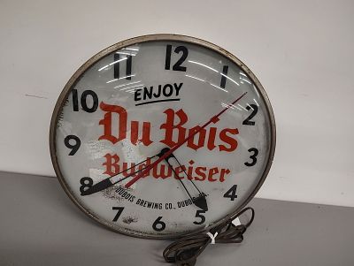 Beer clock. Dubois Budweiser Beer clock does not light up or work Dimensions: 15 x 15 x 4 in