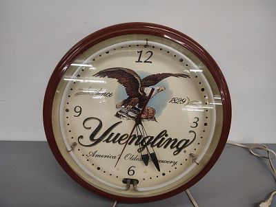Neon beer clock. Yuengling neon clock lights up and works Dimensions: 20 x 20 x 6 in