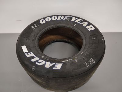 Racing Tire. Goodyear Racing tire 27.5x12.0-15 Dimensions: 13 x 29 x 29 in